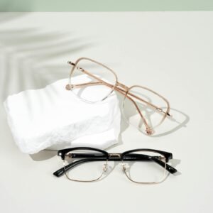 Minimalist image of modern eyeglasses on a neutral background, perfect for fashion and optics.