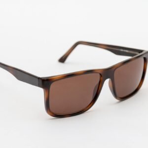 Stylish brown sunglasses close-up on a clean white backdrop, perfect for fashion themes.